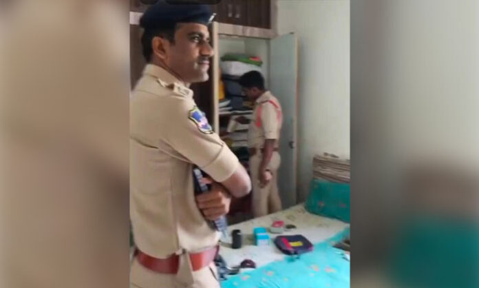 Police investigate a daylight apartment theft at SV Apartments near the Idgah in Nirmal town after robbers stole silver and cash.