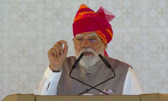 Prime Minister Narendra Modi addresses fuel supply concerns during the inauguration of a petrochemical refinery in Balotra, Rajasthan.