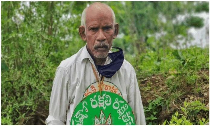 Padma Shri Vanajeevi Ramaiah planting a sapling, symbolizing his lifelong commitment to afforestation and environmental conservation.