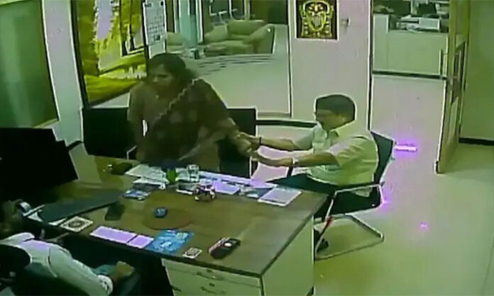 CCTV footage shows an altercation involving an SBI branch manager and Kayalvizhi at the SBI NRI branch in Chennai.