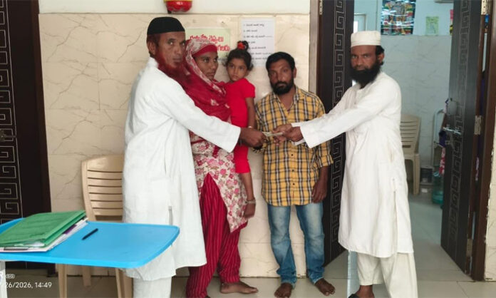 Members of the Sarva Matha Samajika Seva Sangham provide ₹30,000 in financial assistance for the medical treatment of a child suffering from dengue.