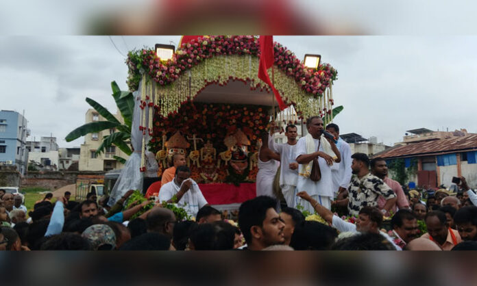 Thousands of devotees participate in the Sri Jagannath Rath Yatra procession in Adilabad.