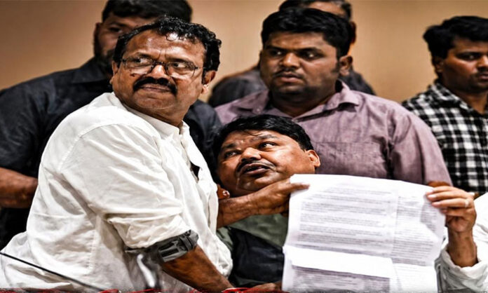 Former APVCC Chairman Bakka Judson submitting an appeal to the Telangana Movement Activists Recognition Committee seeking justice for movement activists.