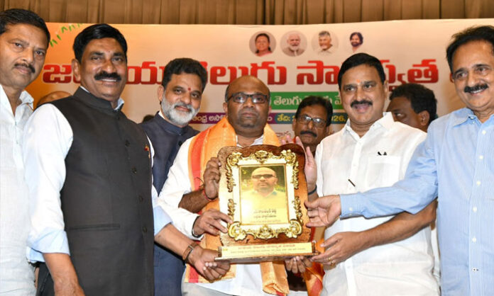 Union Minister Bhupathiraju Srinivasa Varma presents the National Vagdevi Awards to Telugu journalists during the Telugu Velugu Sambaralu event in New Delhi.