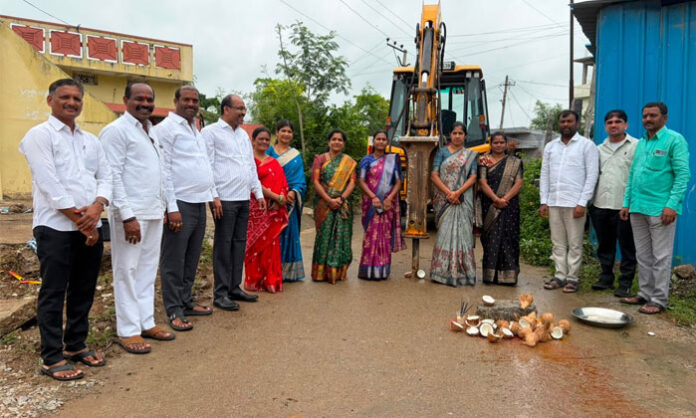 Yellampet Municipal Chairperson Sridevi Ramesh inaugurating drainage construction works in the 24th ward.