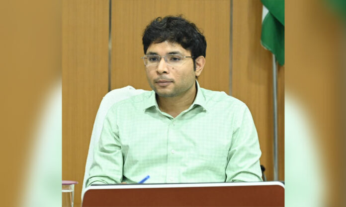District Collector Bhavesh Mishra reviewing municipal sanitation and waste management measures with officials.
