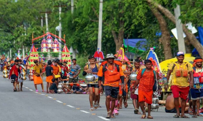 Devotees begin the Kanwar Yatra carrying holy Ganga water for Lord Shiva during the sacred month of Shravana.