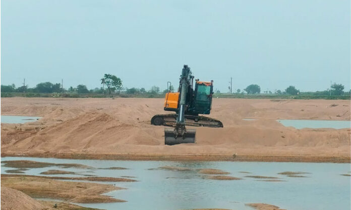 Villagers protest against alleged illegal sand quarry operations in Khazipur, citing groundwater depletion and environmental concerns.