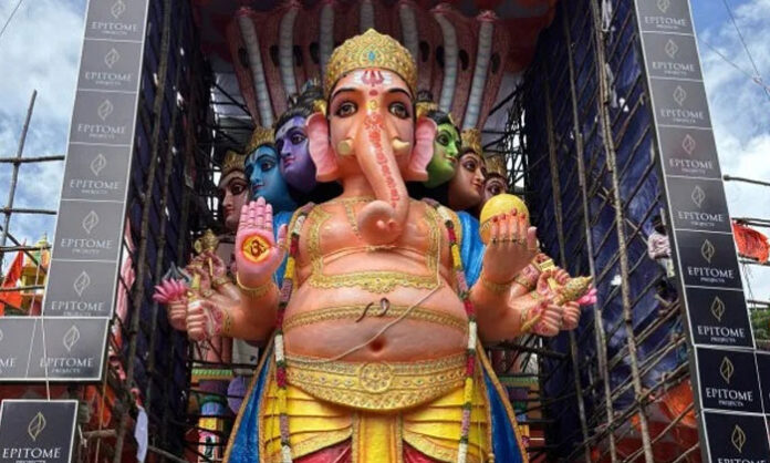Bhagyanagar Ganesh Utsav Samithi leaders announcing the National Flag hoisting and Vande Mataram program for Ganesh pandals across Telangana.