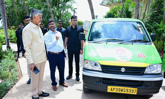 Chief Minister Chandrababu Naidu inspects new Thalli Bidda Express vehicles for maternal and newborn transportation in Andhra Pradesh.