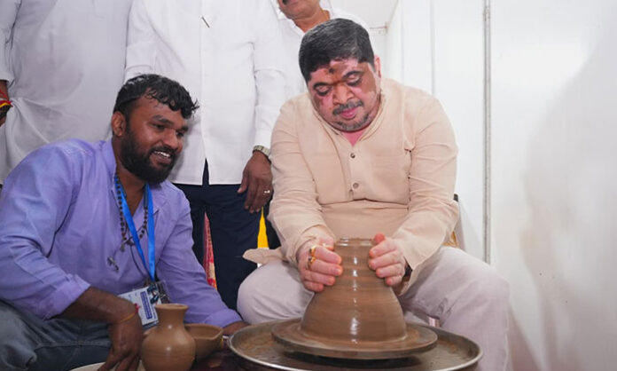 Minister Ponnam Prabhakar visits the Traditional Crafts Fair at HMDA Grounds during the Ashadha Bonalu festival in Hyderabad.