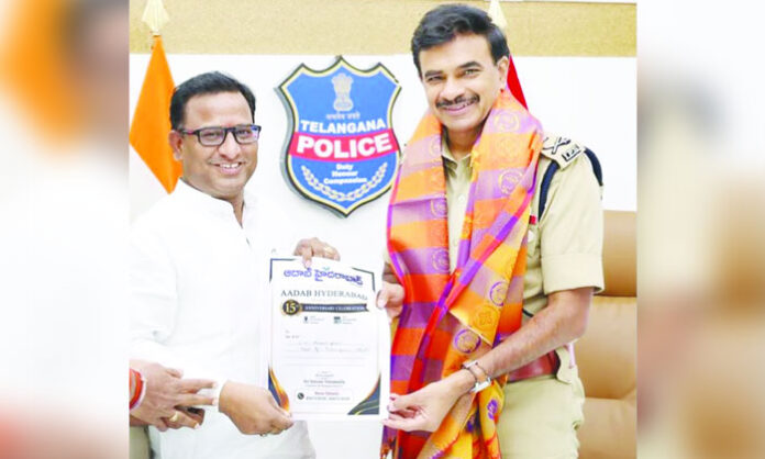 Aadab Hyderabad CMD Satyam Veeramalla invites DGP CV Anand to 15th anniversary celebrations