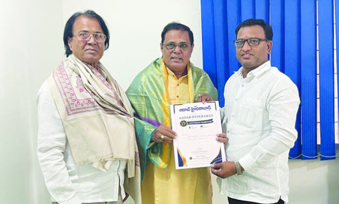 Aadab Hyderabad CMD Satyam Veeramalla invites Ravindra Naik, Kethavath Somalal Naik and Danam Nagender to 15th anniversary celebration