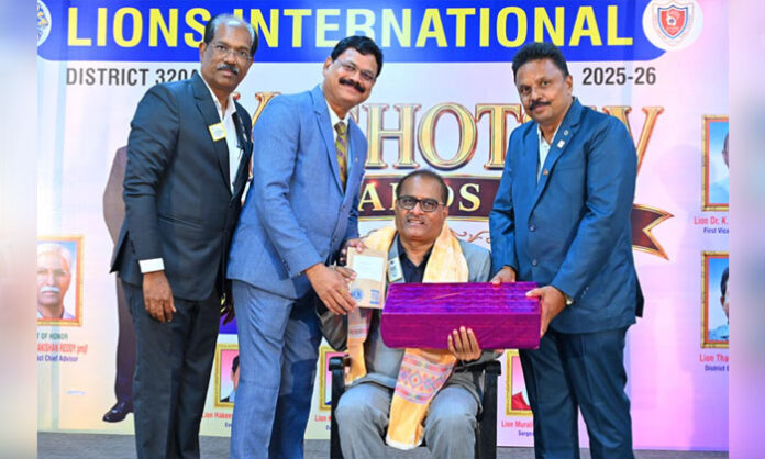 Members of Lions Club of Hyderabad Everest receive awards for outstanding community service at Lions Bhavan in Secunderabad.