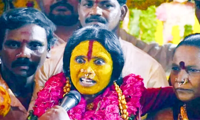 Matangi Swarnalatha delivers the traditional Rangam prophecy during the Ujjaini Mahankali Bonalu celebrations in Secunderabad.