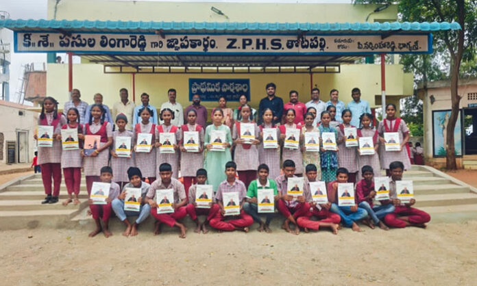Notebooks distributed to Class 8, 9 and 10 students at Thotapalli ZPHS School in Kalwakurthy