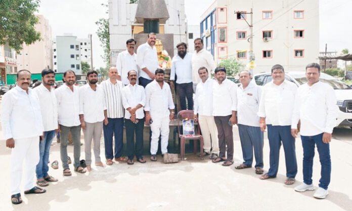 Congress leaders pay floral tributes to Professor Kothapalli Jayashankar's statue during his birth anniversary celebrations in Medchal.