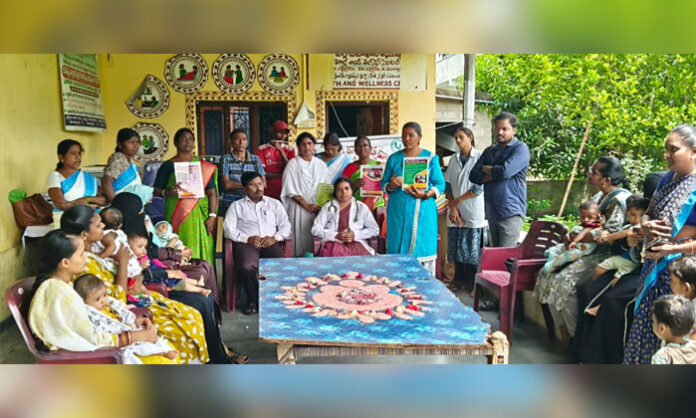 Health officials and mothers participate in World Breastfeeding Week celebrations at the Basti Dawakhana in Luxettipet.