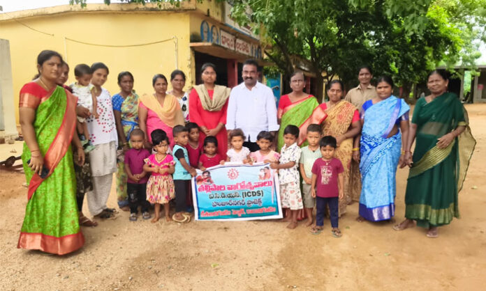 Suryapet District Sarpanchs' Forum President Gundu Ramanji Goud addresses mothers during World Breastfeeding Week celebrations at Anganwadi Centres in Rayanigudem village.