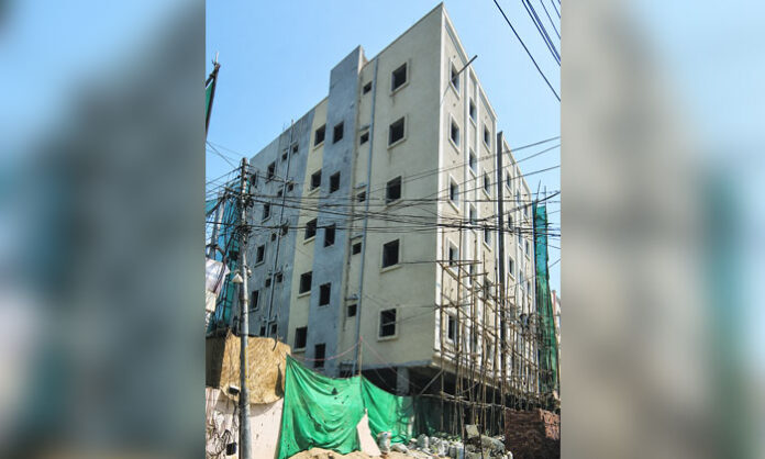 Five-story construction allegedly built beyond the permitted two floors in GHMC Saroornagar Circle