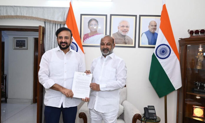 Yellareddy MLA Madan Mohan Rao submits a representation to Union Minister Nitin Gadkari seeking National Highway status for the Karimnagar–Kamareddy–Yellareddy–Pitlam road.