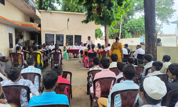 Students participate in a Children's Gram Sabha at Pedaveedu under the Nasha Mukt Bharat Abhiyan to promote drug awareness and healthy living.