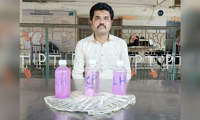 ACB arrests ITDA Boys ST Hostel warden Bhukya Valasimha while accepting a ₹14,000 bribe