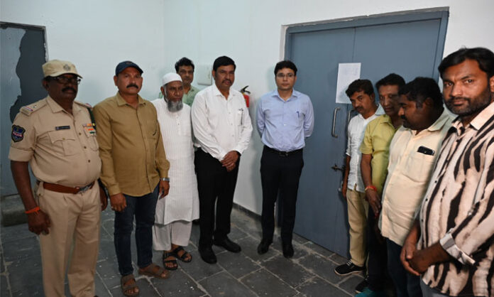 District Collector Bhavesh Mishra inspects EVM warehouse and security systems near the Collectorate