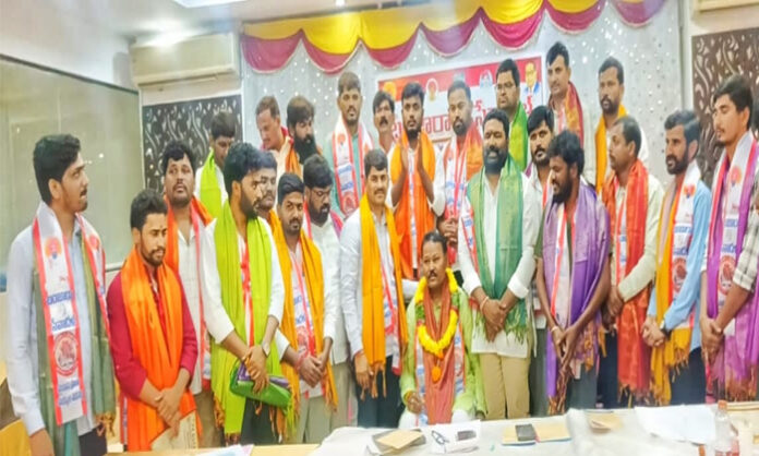 Hanma Naik receiving Banjara Seva Dal appointment letter in Hyderabad