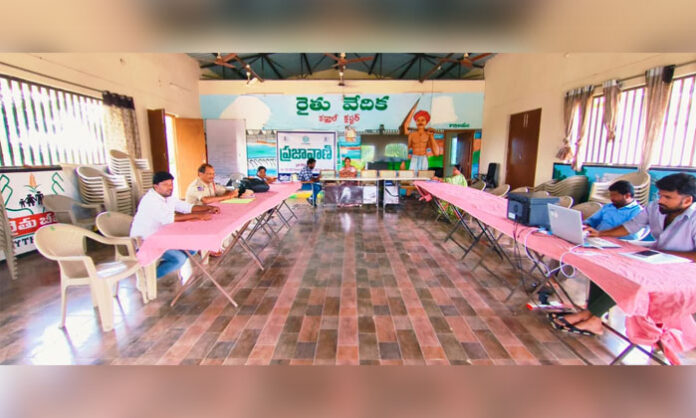 Residents await officials at the Kadthal Prajavani public grievance program
