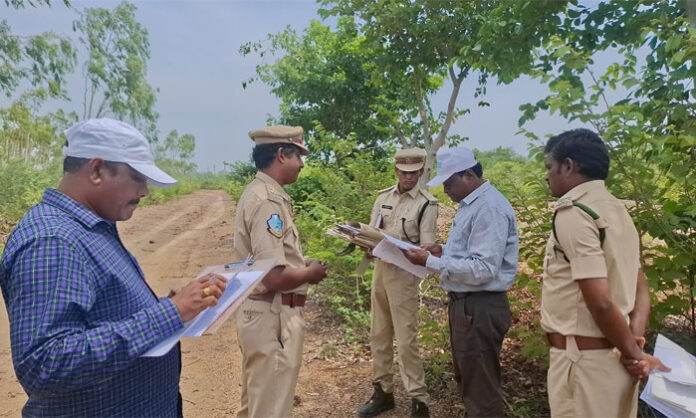 Forest Department vigilance officials inspect disputed land in the Gorlaguda forest beat near Manchya Thanda in Mattampally Mandal, amid objections from tribal farmers claiming cultivation rights.