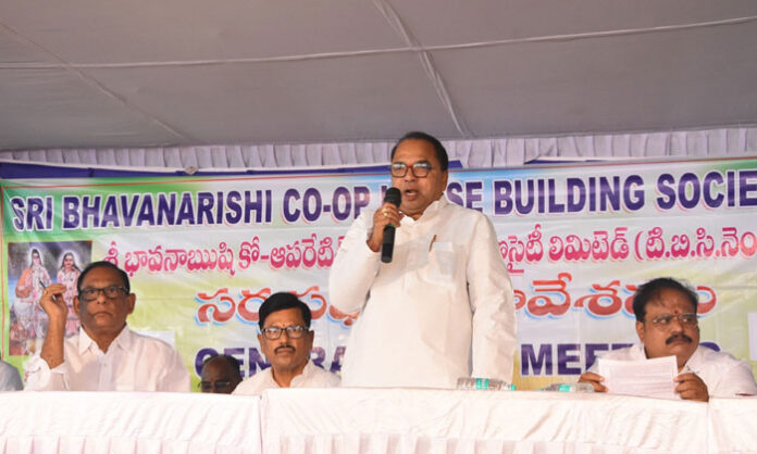 Sri Bhavana Rishi Cooperative Housing Society members attend the Padmashali Township General Body Meeting, where a resolution on unpaid betterment charges was approved.