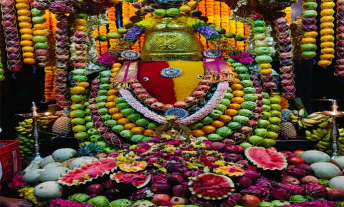 Phalasiddhi Vinayaka idol decorated with fresh fruits at Sri Ganesh Gadda Siddhi Vinayaka Temple in Rudraram