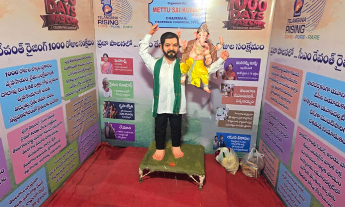 CM Revanth Reddy statue carrying Lord Ganesha on shoulder at unique Ganapati pandal