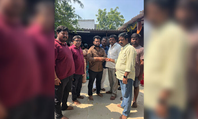 Srinivas Gupta provides financial assistance to a needy family