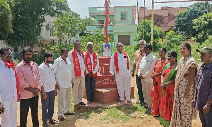 CPI leaders pay floral tributes to Bhagat Singh's portrait during his birth anniversary celebrations at the party office in Jawaharnagar.