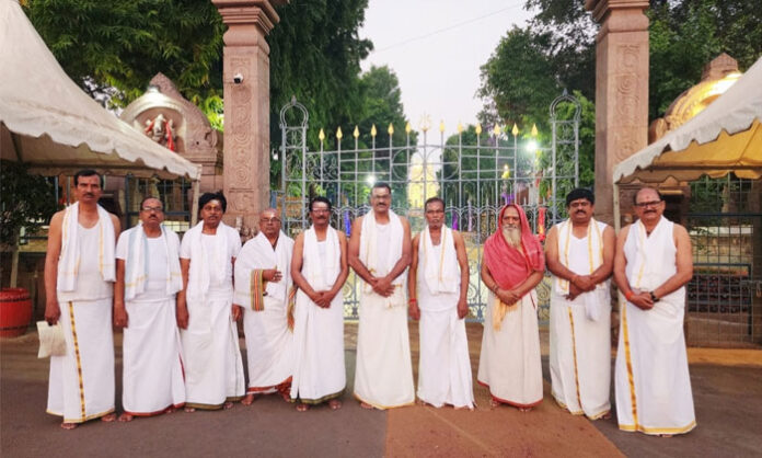 Sadashivapet Veerashaiva Lingayat devotees immerse sacred flowers and leaves in Srisailam Pathalaganga