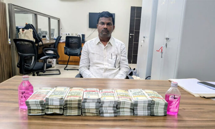 ACB officials arrest Abdullapurmet Tahsildar B. Sudarshan Reddy and Mandal Surveyor Bathuka Srinivasulu in an alleged ₹20 lakh bribery case.