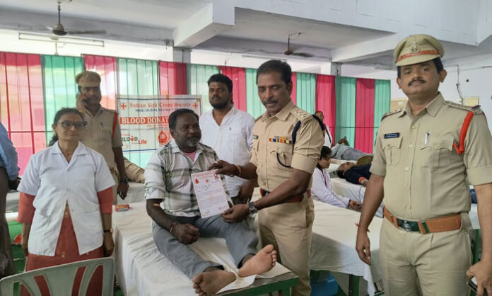 ACP Kiran Kumar attends a blood donation camp organized in memory of police martyrs at Arya Vysya Bhavan in Bellampalli.