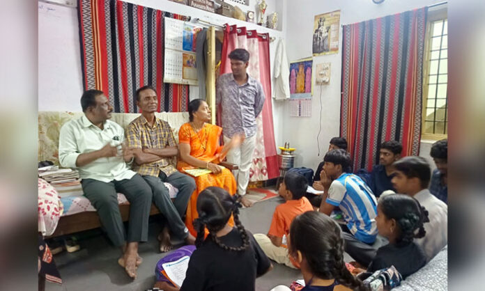 MV Foundation District Coordinator Swami addresses a youth meeting at Tukaramgate on child marriage prevention and child rights.