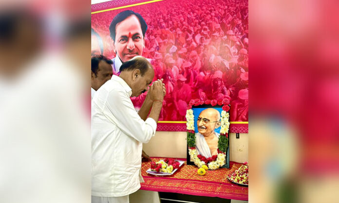 Sangareddy MLA Chinta Prabhakar garlands Mahatma Gandhi’s portrait during Gandhi Jayanti celebrations at his camp office.