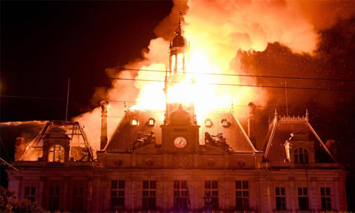 Fire damage at the historic Limoges Town Hall in France following protests over the rising cost of living.
