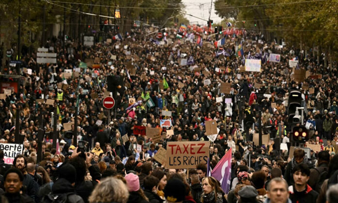 Police confront protesters during violent demonstrations spreading across France, with nearly 1,000 people reportedly arrested.