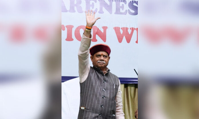 Governor Shiv Pratap Shukla leads students in an anti-drug pledge during the Nasha Mukt Bharat awareness program at Osmania University.