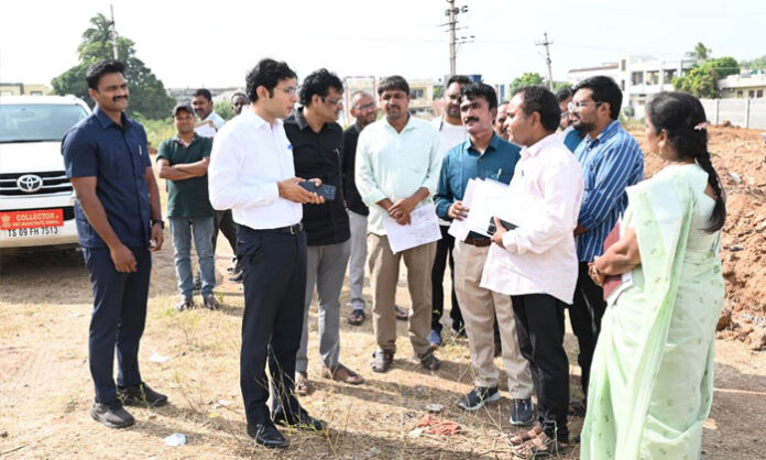 Nirmal District Collector Bhavesh Mishra inspects alleged encroachments within the FTL limits of Dharmasagar Lake and orders the removal of unauthorized structures.