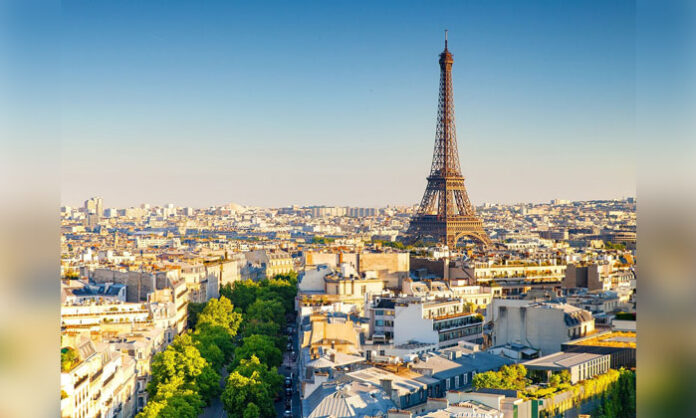 French authorities investigate a shooting near Paris that left one person dead and four seriously injured, with a suspect in custody.