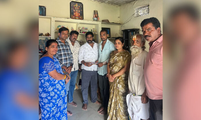 Former Deputy Mayor Reddy Shetty Srinivas provides Rs. 10,000 in financial assistance to dialysis patient Sandam Sai Kumar in Jawaharnagar.