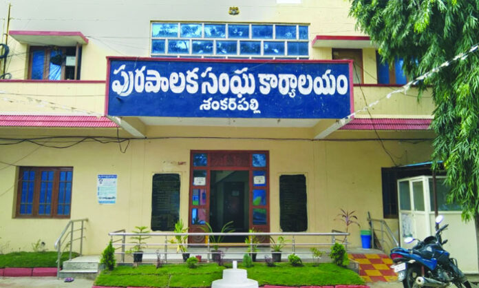 Shankarpalli residents demand an inquiry into alleged GO 111 violations, illegal constructions, and municipal permit irregularities.