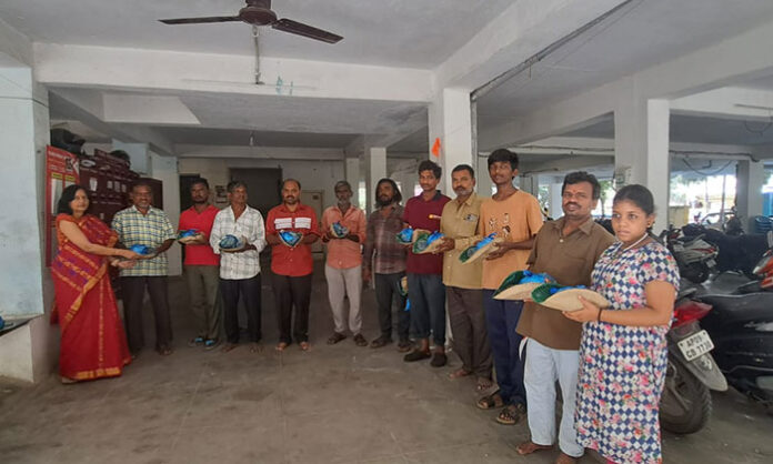 Sri Akanksha Charitable Trust distributes food, essential commodities and clothing during Mahalaya Amavasya in memory of Rajyalakshmi Planjari.