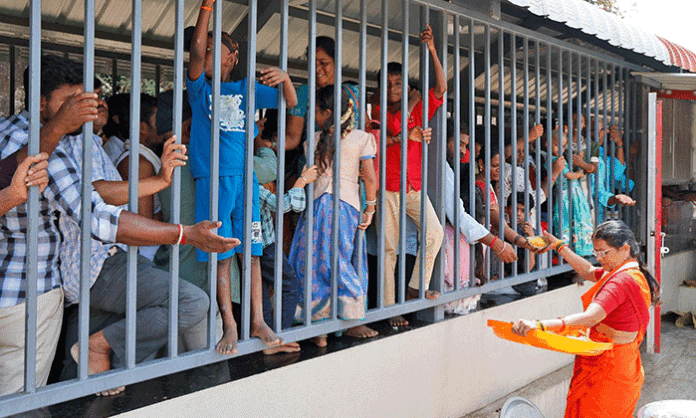 Devotees wait in Vaikuntham Queue Complex for Tirumala darshan